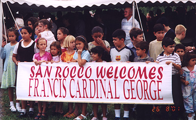 Children welcoming Cardinal George