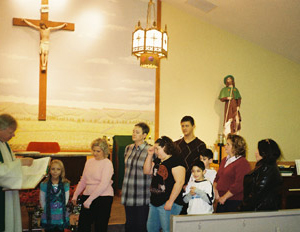 Liturgy of the Word at the front of church