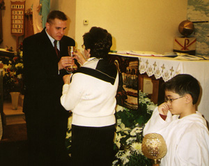Jon Niemi receiving Communion